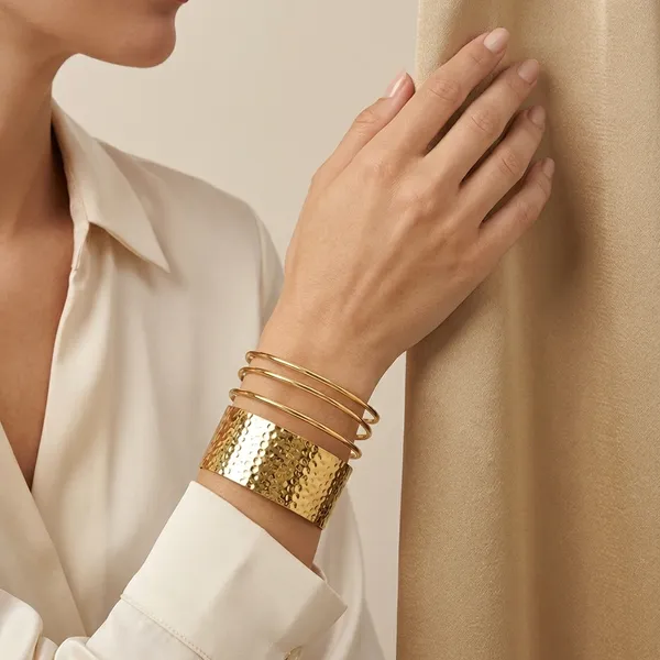 Hammered_Gold_Cuff_Bracelet_With_Triple_Band_Detail_For_Women