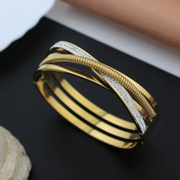 Gold_Tone_Twisted_Bangle_Bracelet_With_Crystal_Accents_For_Women