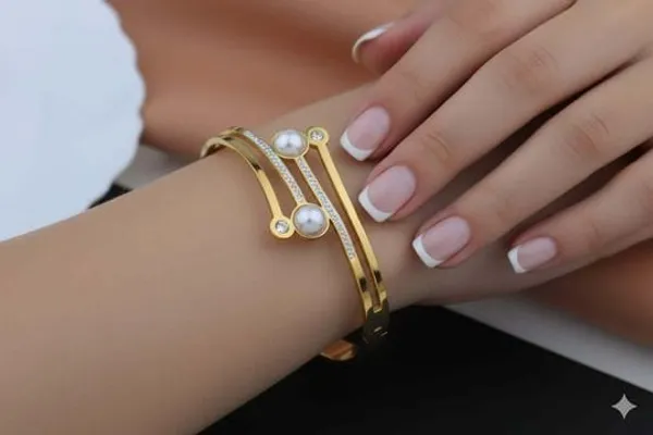 Elegant_Gold_Tone_Bangle_With_Pearl_And_Crystal_Accents_For_Women