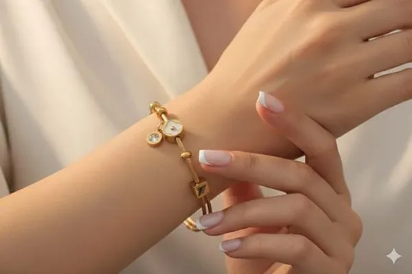 Gold_Tone_Adjustable_Charm_Bracelet_With_Floral_And_Circle_Pendants_For_Women