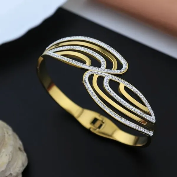 Gold_And_Silver_Tone_Leaf_Design_Diamond_Studded_Bracelet_For_Women