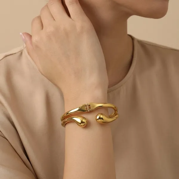 Gold_Toned_Open_Cuff_Bracelet_With_Teardrop_Ends_For_Women
