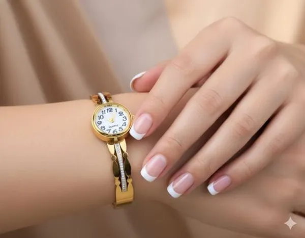Elegant_Gold_Tone_Bangle_Watch_With_White_Dial_And_Crystal_Accents_For_Women