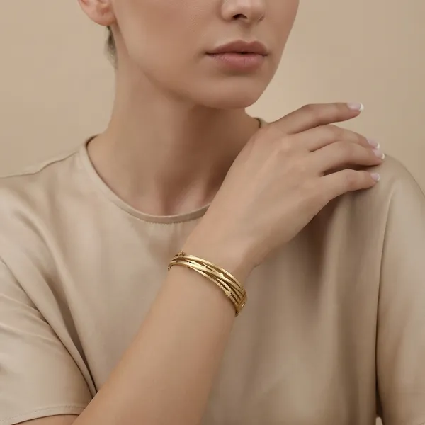 Elegant_Gold_Toned_Multilayer_Bangle_Bracelet_For_Women