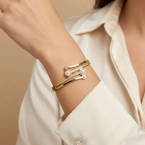Elegant_Gold_Tone_Bangle_With_Pearl_And_Crystal_Accents_For_Women