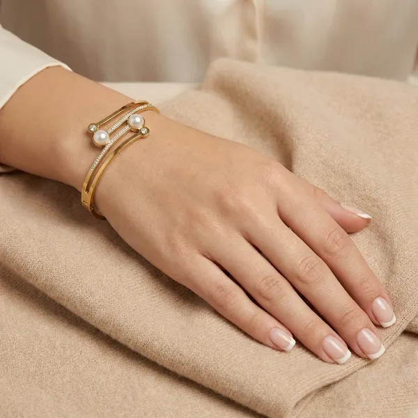 Elegant_Gold_Tone_Bangle_With_Pearl_And_Crystal_Accents_For_Women