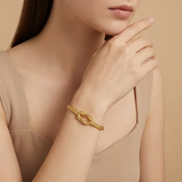 Elegant_Gold_Tone_Knot_Bangle_Bracelet_For_Women