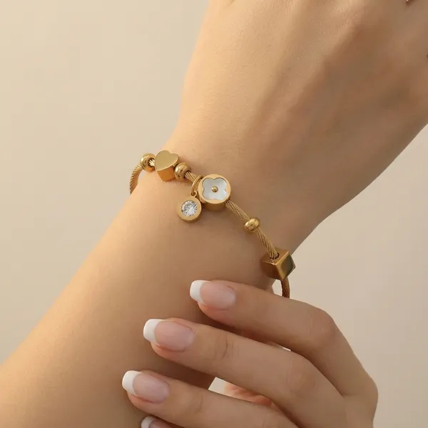 Gold_Tone_Adjustable_Charm_Bracelet_With_Floral_And_Circle_Pendants_For_Women