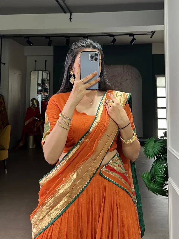 Orange_Silk_Lehenga_Choli_With_Gold_Border_And_Embroidered_Dupatta