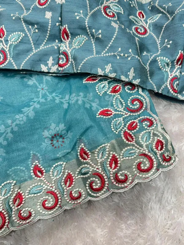 Turquoise_Floral_Print_Saree_With_Embroidered_Border_And_Unstitched_Blouse