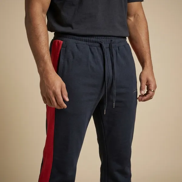 Navy_Blue_And_Red_Imp_Jordan_Cruss_Track_Pants_For_Men