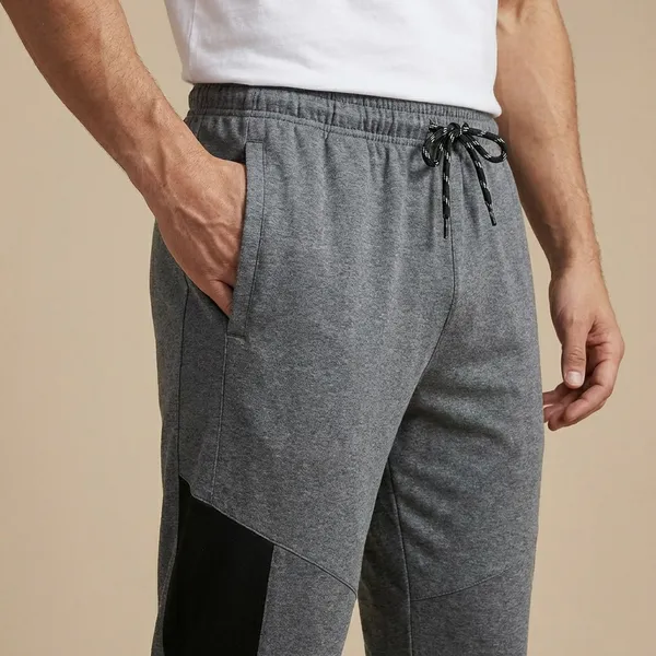 Grey_And_Black_Imp_Auro_Knit_Joggers_For_Men