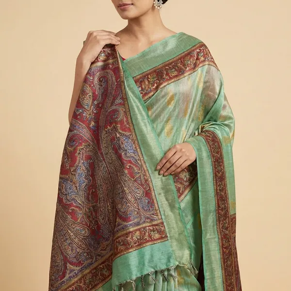 Elegant_Green_Silk_Saree_With_Red_Blouse