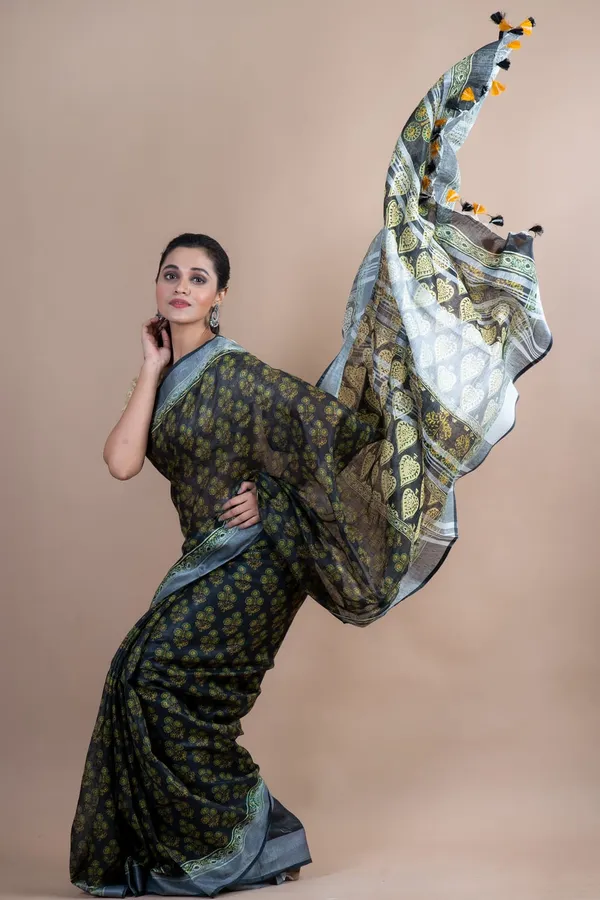 Elegant_Black_And_Green_Printed_Chanderi_Silk_Saree_With_Contrast_Border_And_Pom-Pom_Details