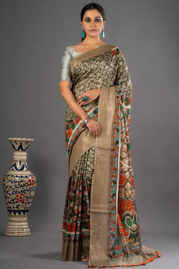 Kalamkari_Printed_Saree_With_Silver_Blouse_And_Decorative_Border