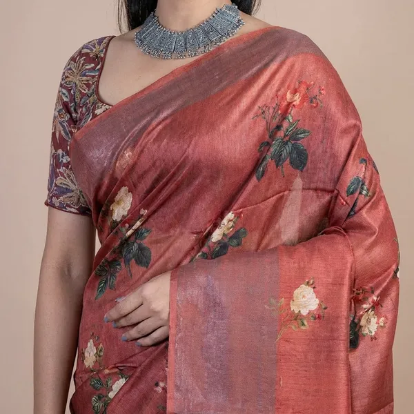 Elegant_Rust_Silk_Saree_With_Floral_Motifs_And_Printed_Blouse
