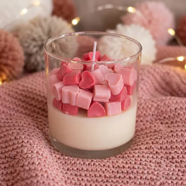 Pink_Heart-Shaped_Wax_Candle_In_Glass_Holder_With_White_Base