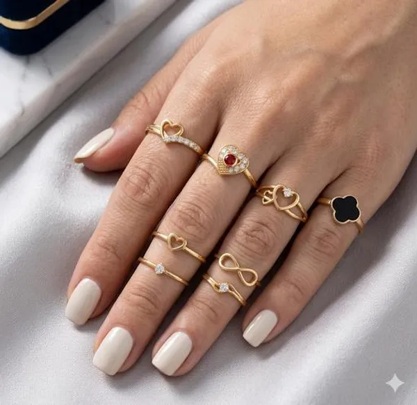 18K_Gold_Plated_Minimalist_Stackable_Ring_Set_–_8_Piece_Heart,_Infinity,_and_Black_Clover_Motif_Collection