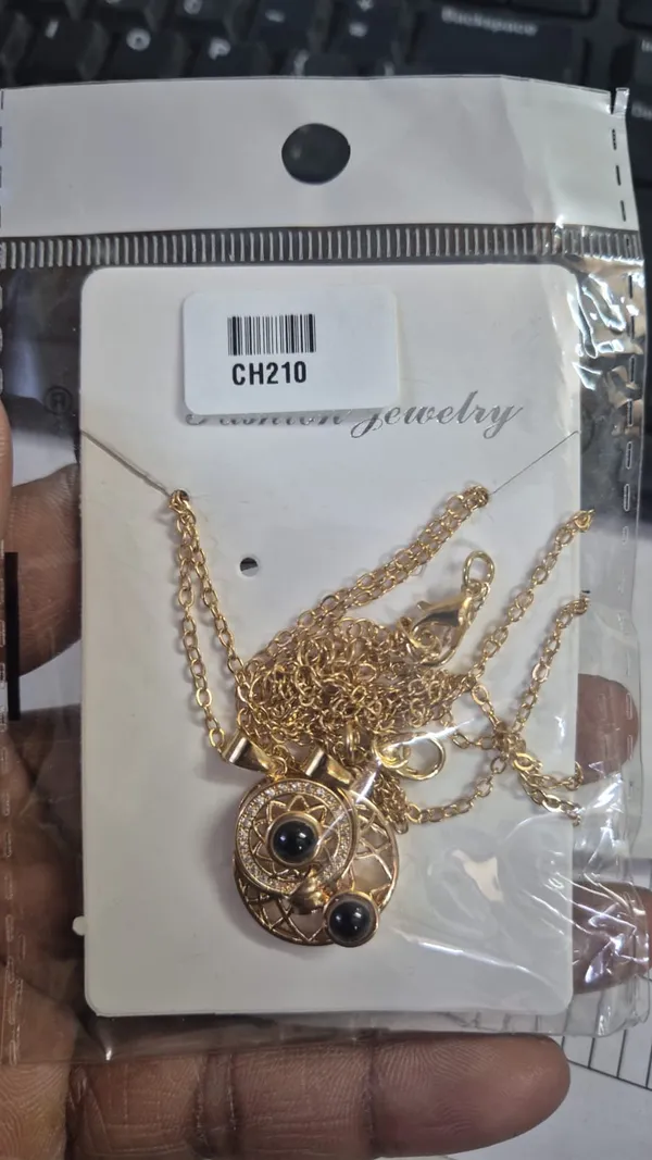 Gold-Toned_Panda_Pendant_Necklace_with_Crystal_Accents