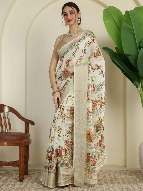 Ivory_White_Banarasi_Art_Silk_Saree_with_Traditional_Folk_Dance_Print_&_Elegant_Zari_Border