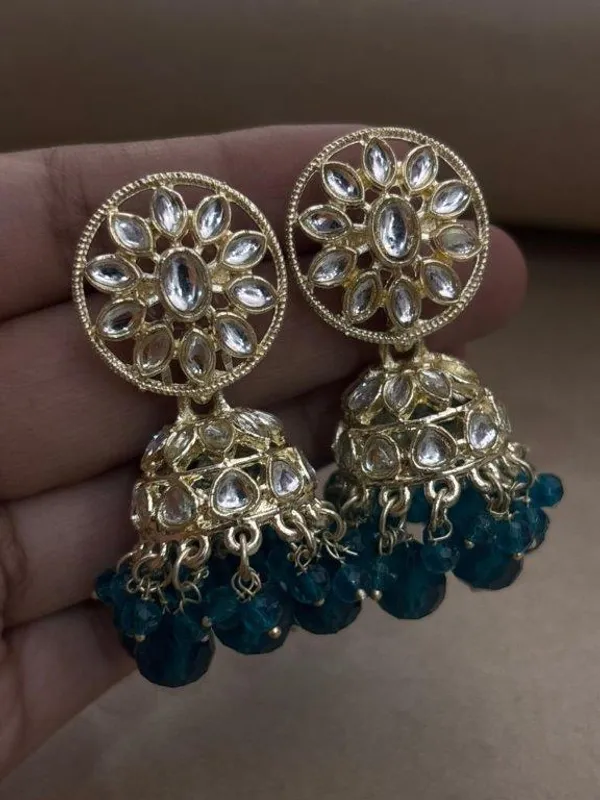 Kundan_Earrings__Enhance_your_look_with_these_elegant_Kundan_earrings,_crafted_to_add_a_touch_of_traditional_charm.__Material:_Mixed_Metal_Stone_Work:_Kundan_stones_and_moti_work_light_weight_jhumki_Size:_2_inches_Care_Instructions:__Store_in_a_zip-lock_pouch_after_use_to_maintain_shine_and_longevity_Avoid_contact_with_water,_perfume,_or_any_chemicals_Perfect_for_festive_occasions,_weddings,_or_adding_a_graceful_touch_to_your_everyday_style_???