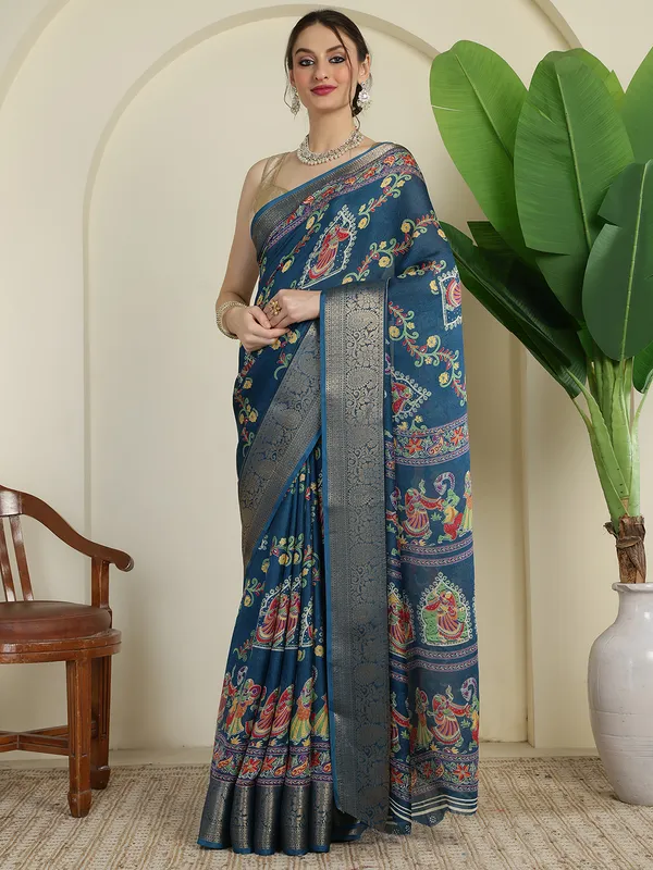 Royal_Steel_Blue_Banarasi_Art_Silk_Saree_with_Traditional_Folk_Motif_Print_&_Rich_Zari_Border