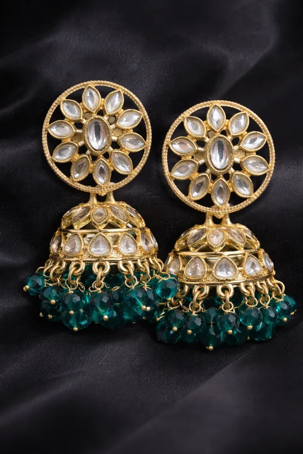 Kundan_Earrings__Enhance_your_look_with_these_elegant_Kundan_earrings,_crafted_to_add_a_touch_of_traditional_charm.__Material:_Mixed_Metal_Stone_Work:_Kundan_stones_and_moti_work_light_weight_jhumki_Size:_2_inches_Care_Instructions:__Store_in_a_zip-lock_pouch_after_use_to_maintain_shine_and_longevity_Avoid_contact_with_water,_perfume,_or_any_chemicals_Perfect_for_festive_occasions,_weddings,_or_adding_a_graceful_touch_to_your_everyday_style_???