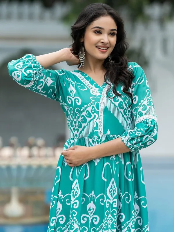 Green_Chanderi_Premium_&_Fancy_Design_Gown_For_Women