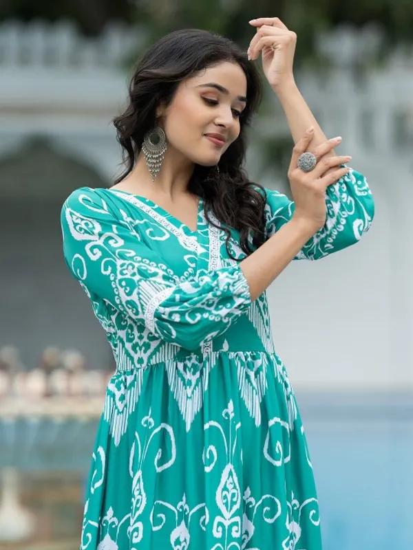 Green_Chanderi_Premium_&_Fancy_Design_Gown_For_Women