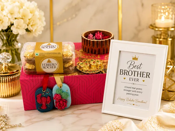 Raksha_Bandhan_Premium_Gift_Hamper_for_Brother_|_Ferrero_Rocher_Chocolates,_Decorative_Lotus_Candle,_Designer_Rakhi,_Photo_Frame_&_Festive_Decor_Gift_Box_|_Rakhi_Gift_for_Brother