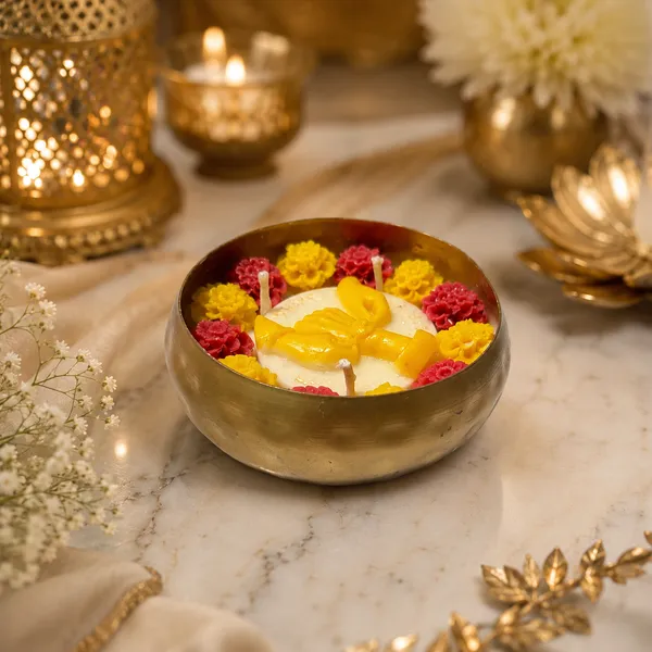 Raksha_Bandhan_Celebration_Urli_Candle–_Brass_Bowl_with_Floral_Wax_Flowers_&_Golden_Bond_Motif