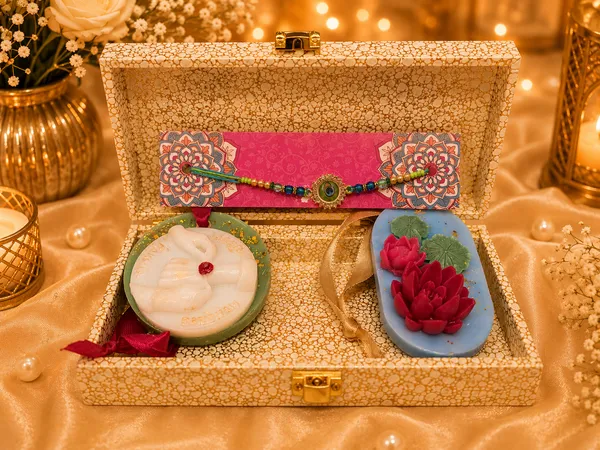 Royal_Rakhi_Keepsake_Box_–_Premium_Raksha_Bandhan_Gift_Set_with_Designer_Evil_Eye_Rakhi,_Bhaiya-Bhabhi_Candle_&_Lotus_Floral_Candle_|_Luxury_Gift_for_Brother