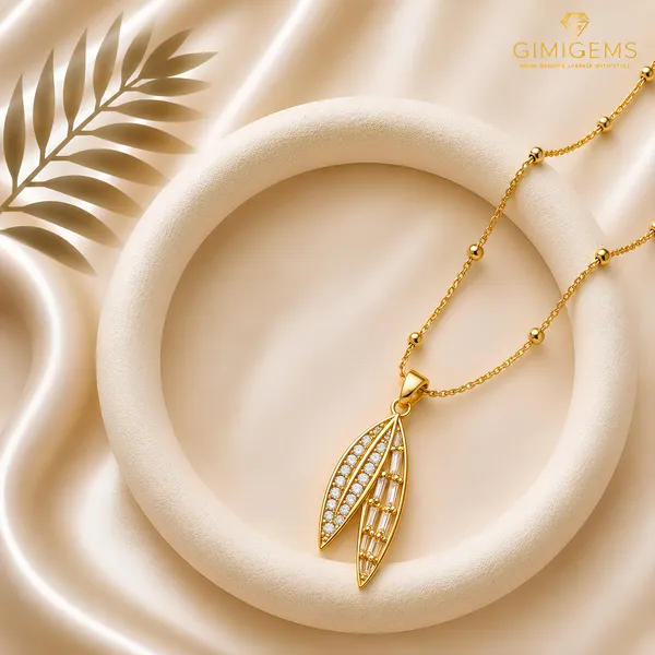 Dual_Leaf_CZ_Pendant_Necklace_GIMIGEMS_18K_Gold-Plated,_Anti-Tarnish_Necklace_for_Women_|_316L_Stainless_Steel_|_Waterproof_|_Hypoallergenic_|_PVD_Gold_Plated_|_Baguette_&_American_Diamond_Leaf_Pendant_|_Daily_Wear_Gift_Jewelry