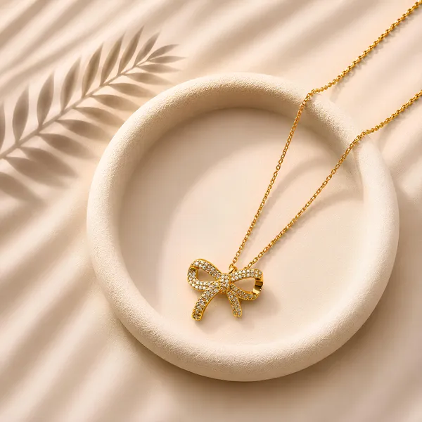 Luxe_Bow_Knot_Necklace_–_GIMIGEMS_18K_Gold-Plated,_Anti-Tarnish_Bow_Pendant_Necklace_for_Women_|_316L_Stainless_Steel_|_American_Diamond_|_Waterproof_|_Hypoallergenic_|_0.05_Micron_PVD_Gold_Plating_|_Daily_Wear_Luxury_Jewelry_Gift
