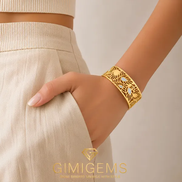 Elegant_Gold-Plated_Floral_Filigree_Bangle_With_Crystal_Accents