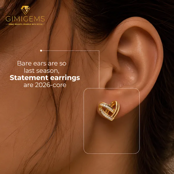 Gold-Toned_Heart-Shaped_Earrings_With_Baguette_Stone_Detailing