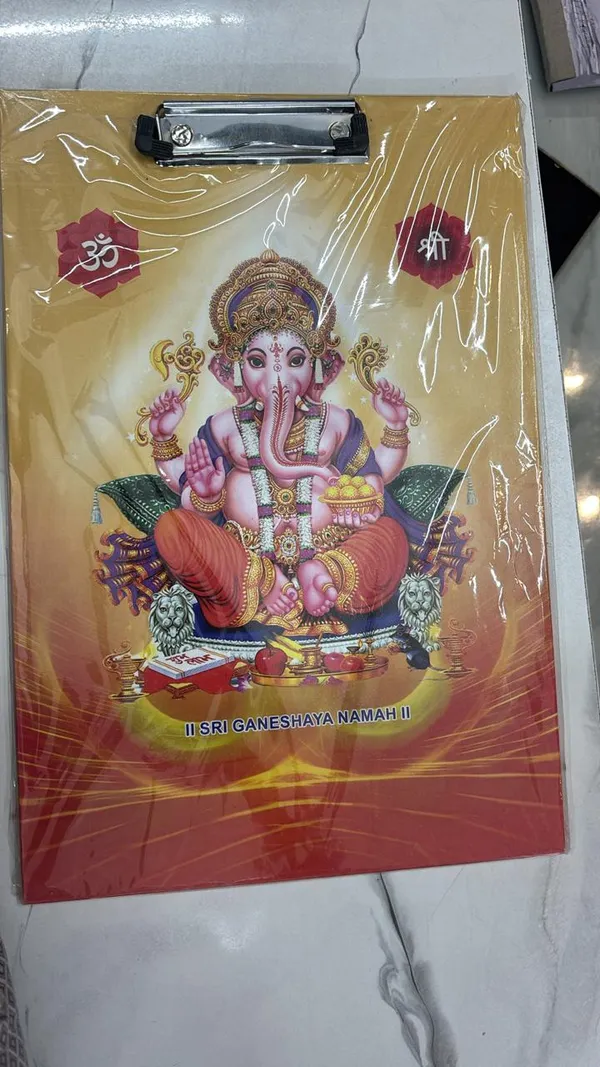 Pack_Of_10_Yellow_Lord_Ganesha_Clipboard_With_Plastic_Cover_23_×_36_Cm