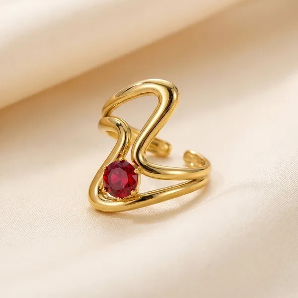 Gold-Plated_Ring_With_Red_Stone_And_Abstract_Design_For_Women