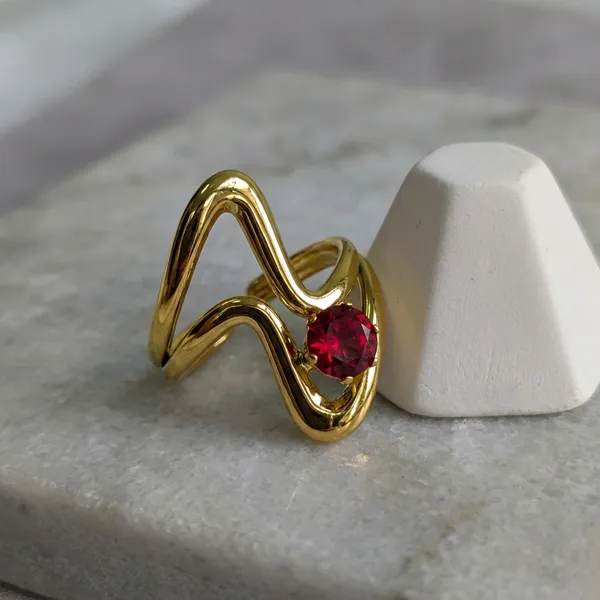 Gold-Plated_Ring_With_Red_Stone_And_Abstract_Design_For_Women
