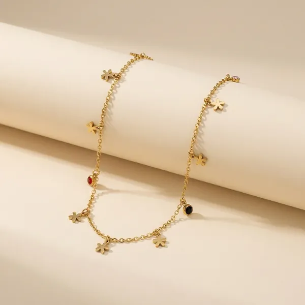 Gold-Toned_Charm_Bracelet_With_Delicate_Dangling_Accents_For_Women