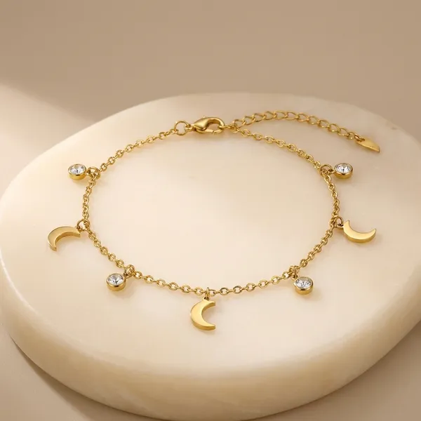 Elegant_Gold-Tone_Celestial_Charm_Bracelet_With_Moon,_Star_&_Sun_Pendants_For_Women