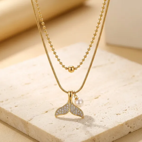 Elegant_Dual-Layer_Gold_Chain_Necklace_With_Mermaid_Tail_Pendant_And_Pearl_Accent_For_Women