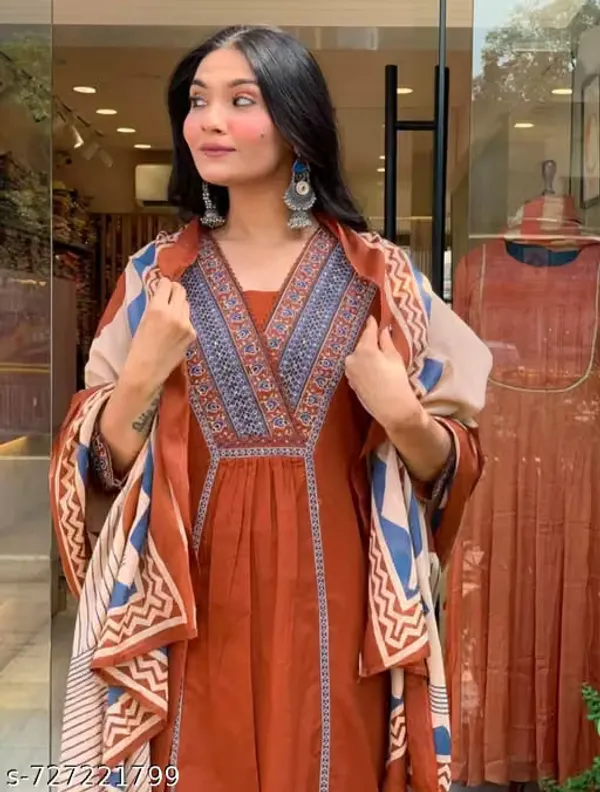 Orange_(Rust)_Kurta_Set_With_Printed_Patch_Work_on_kurti_with_mactching_bottom_and_Printed_Mul_dupatta