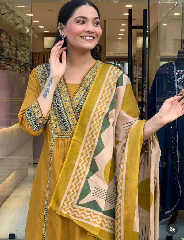 Yellow_Kurta_Set_With_Printed_Patch_Work_on_kurti_with_mactching_bottom_and_Printed_Mul_dupatta