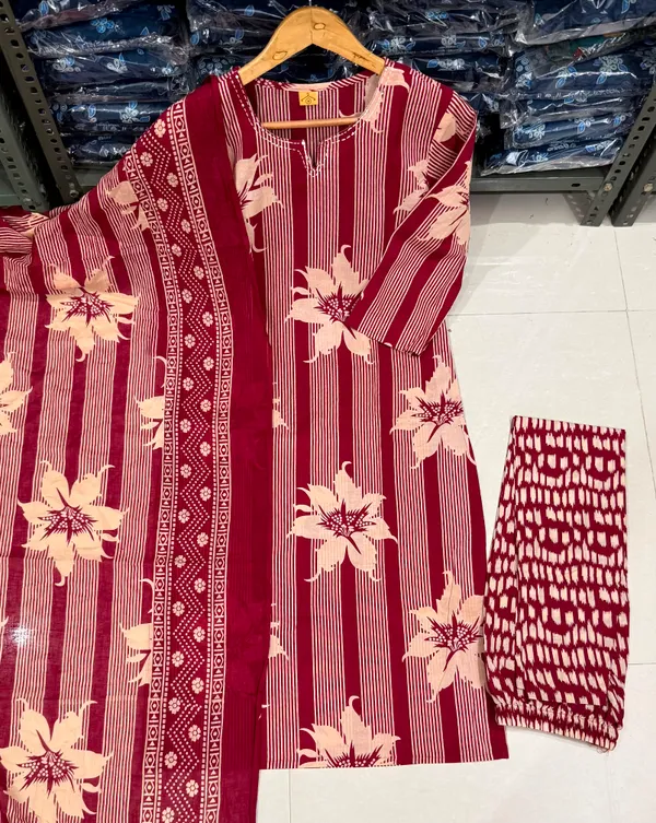 Red_cotton_Kurta_set_with_cotton_pant_and_dupatta_with_Sequence_work_on_Neck_line