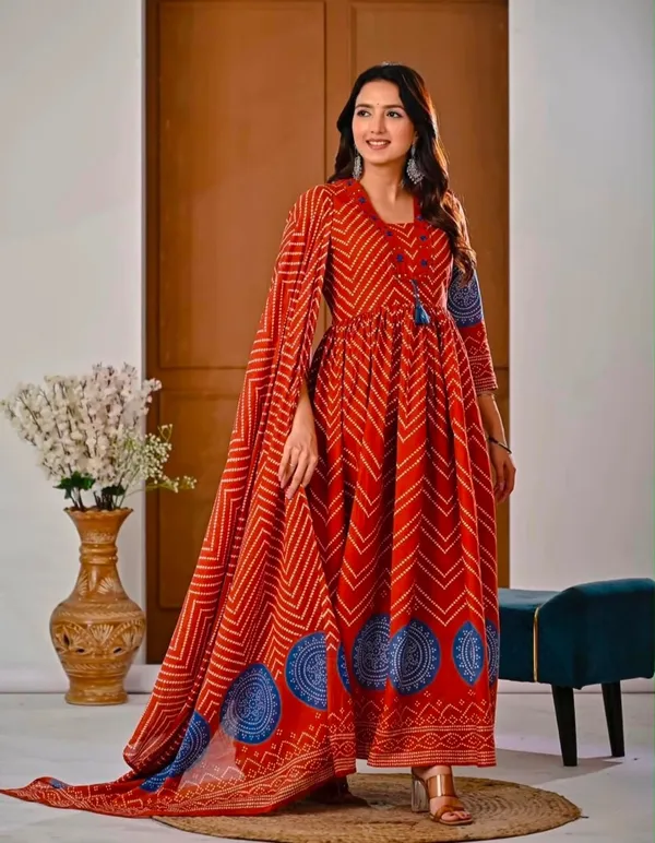 Orange_Bandej_Print_Kurta_Set_with_Handwork_On_Yoke_with_Stylish_Dori_and_Mul_Mul_dupatta