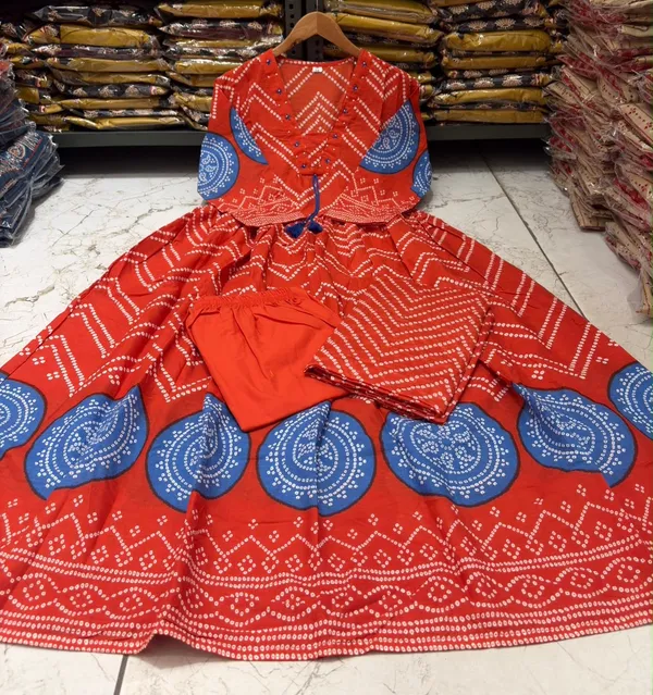 Orange_Bandej_Print_Kurta_Set_with_Handwork_On_Yoke_with_Stylish_Dori_and_Mul_Mul_dupatta