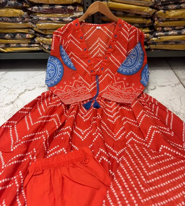Orange_Bandej_Print_Kurta_Set_with_Handwork_On_Yoke_with_Stylish_Dori_and_Mul_Mul_dupatta