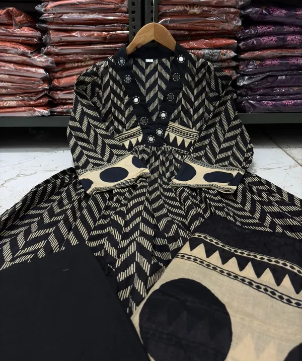 Black_A-line_kurta_set_with_Mirror_work_on_Neck_line_paired_with_Matchin_pant_and_Soft_Mul_Dupatta