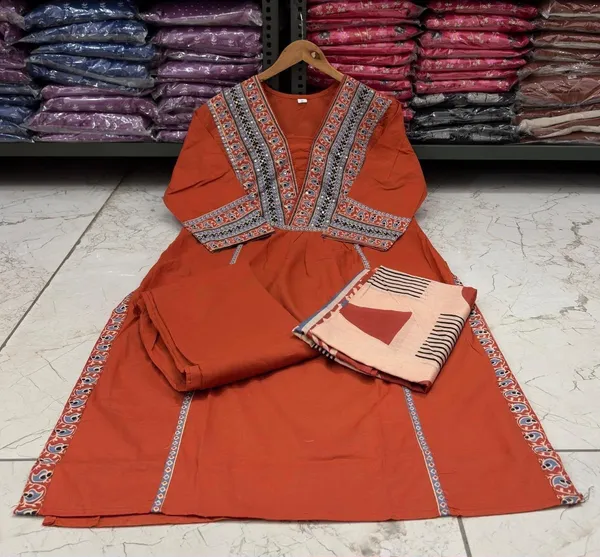 Orange_(Rust)_Kurta_Set_With_Printed_Patch_Work_on_kurti_with_mactching_bottom_and_Printed_Mul_dupatta